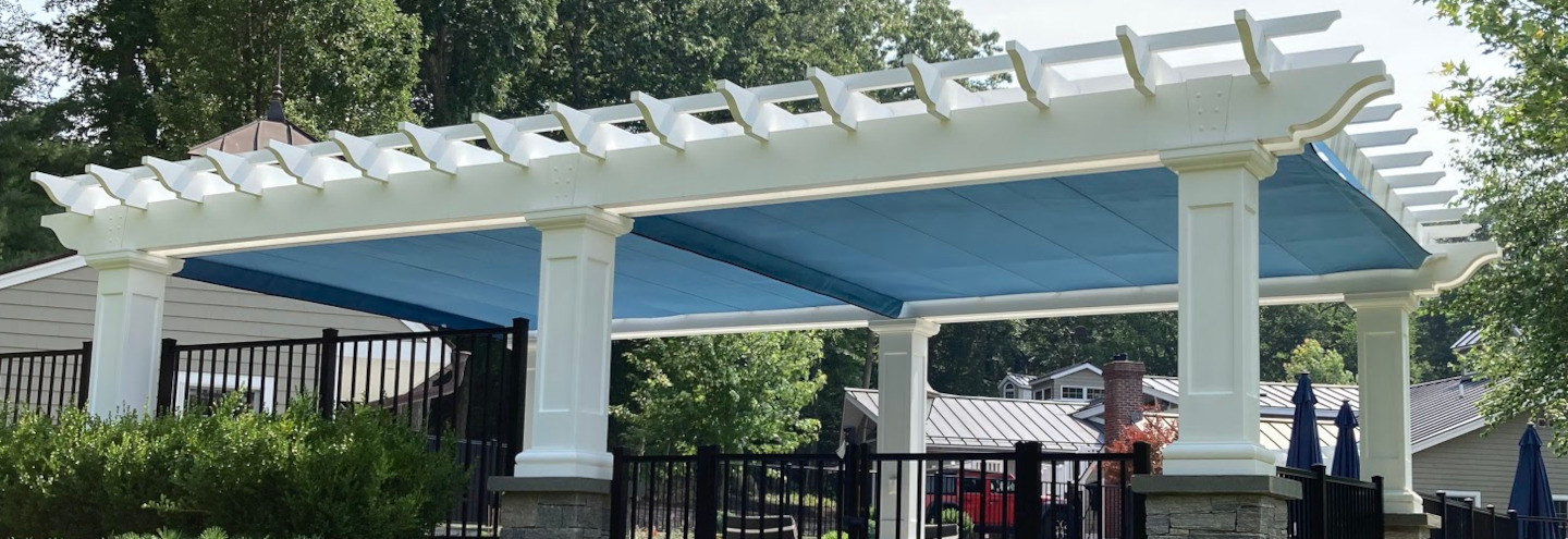 Fiberglass pergola with shade canopy