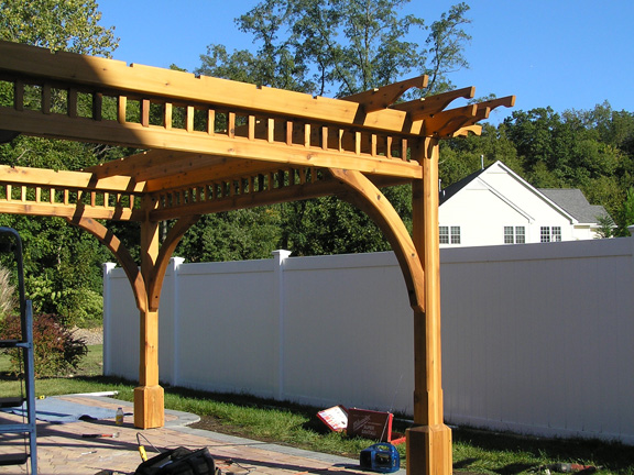 Baldwin Pergolas may be able to install your pergola depending on where you are.