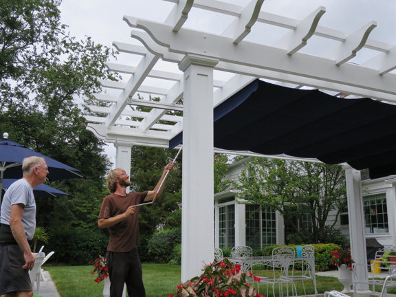 Poolside fiberglass pergola with canopy in Connecticut