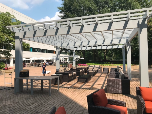Modern style pergola in a large public courtyard