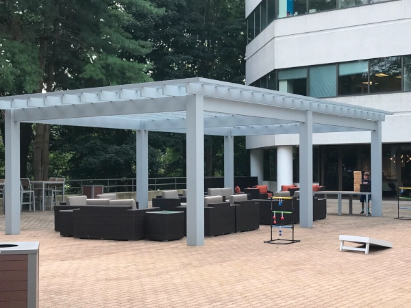 Modern style pergola in a large public courtyard